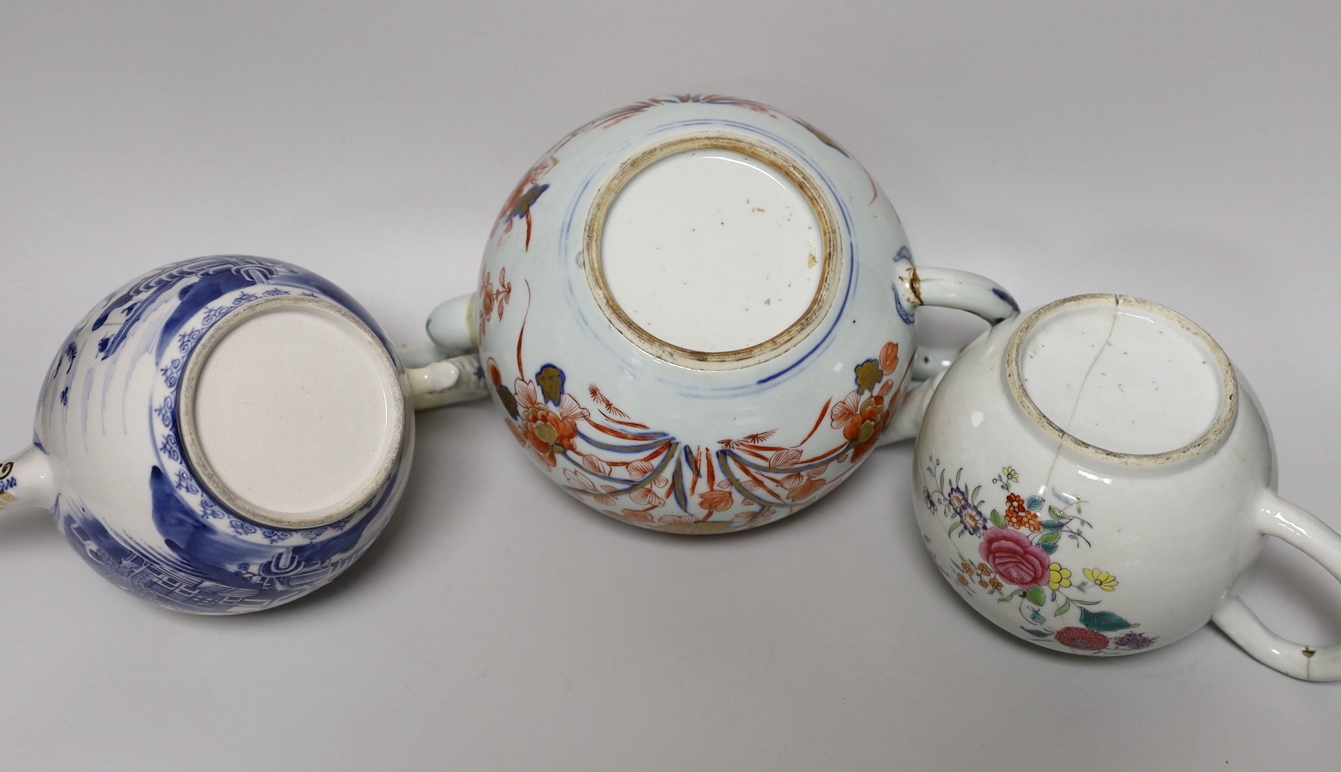 Four 18th century Chinese Export porcelain teapots. Tallest 15cm